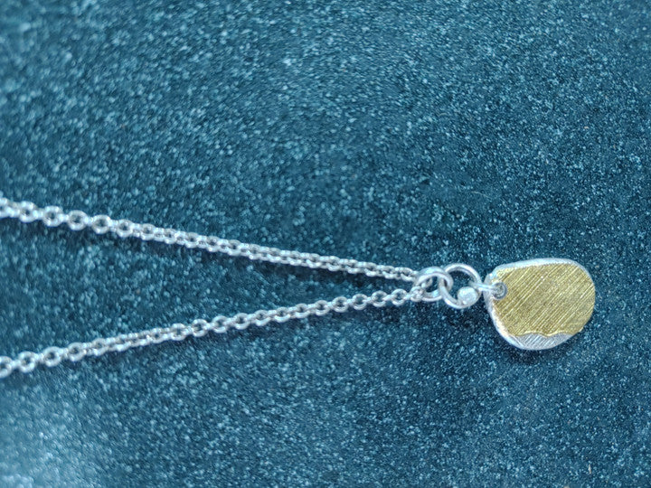 Ipsa silver pendant — detail