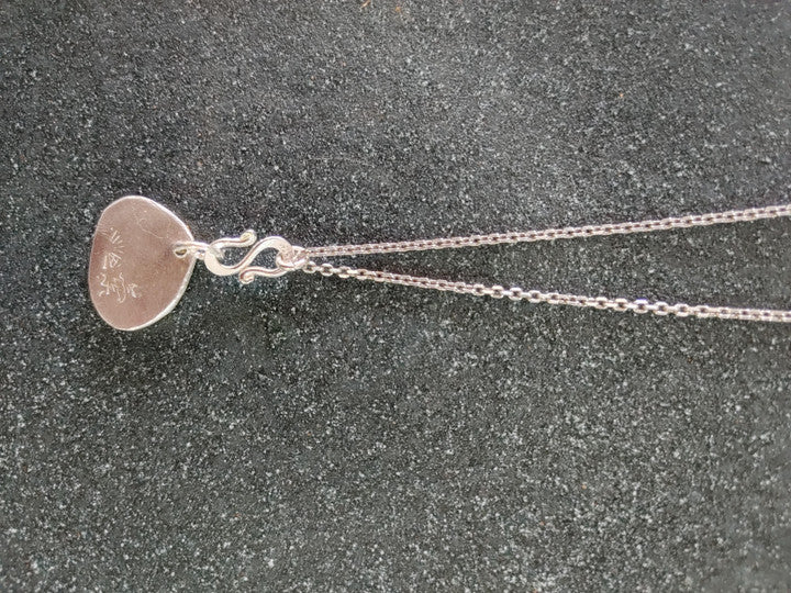 Ipsa silver pendant — detail