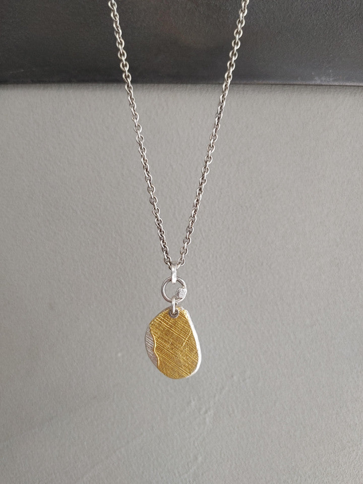 Ipsa silver pendant with gold inlay