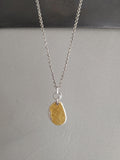 Ipsa silver pendant with gold inlay